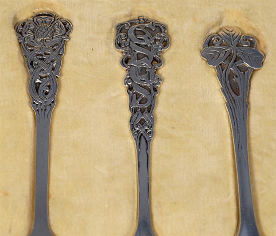 A rare cased set of three George V Arts & Crafts silver spoons, by Omar Ramsden, Length each 162mm total weight 4.8oz/150grms